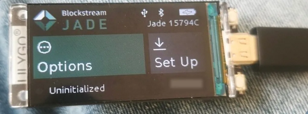 The Jade home screen on the LilyGO T-Display S3 right after flashing, showing Options, Uninitialized and Set Up
