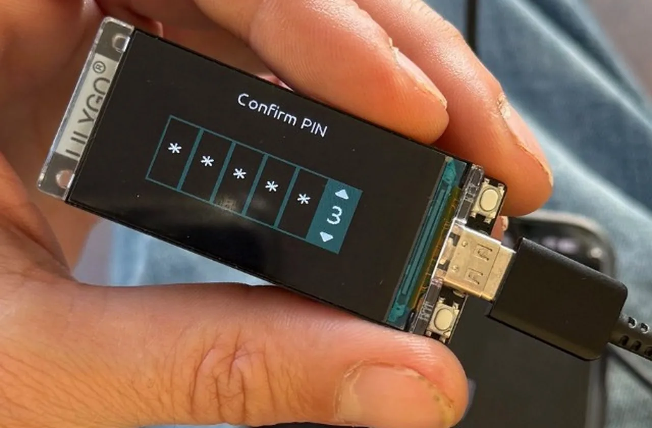 The Confirm PIN screen on the LilyGO T-Display S3 running Jade, with the two buttons on the side of the board